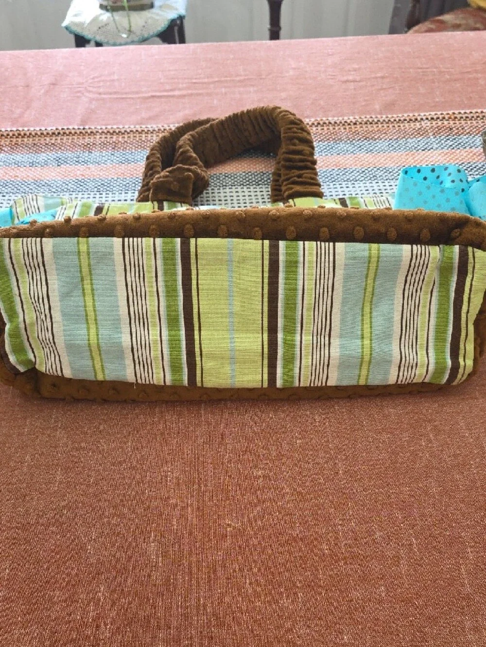 Striped Green and Brown Baby Bag with Blue Accents